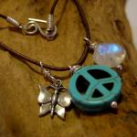 #009 Peace handmade leather necklace, 19" long, handmade sterling silver clasp. Charms are: sterling silver butterfly, turquoise peace sign and a beautiful moonstone nugget with blue fire. 20" Sale! $40
